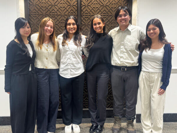 Six students pose for a photo