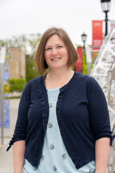 Photo of Alexa Maille outside the Polyform near Martha Van Rensselaer Hall at Cornell.